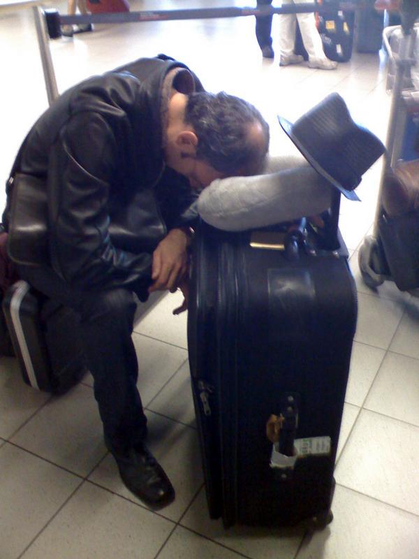 A very tired Mr. Gomez in the airport on the way home ...